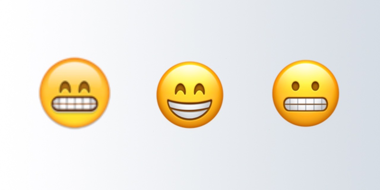 So sánh emoji "beaming face" và "grimacing face"